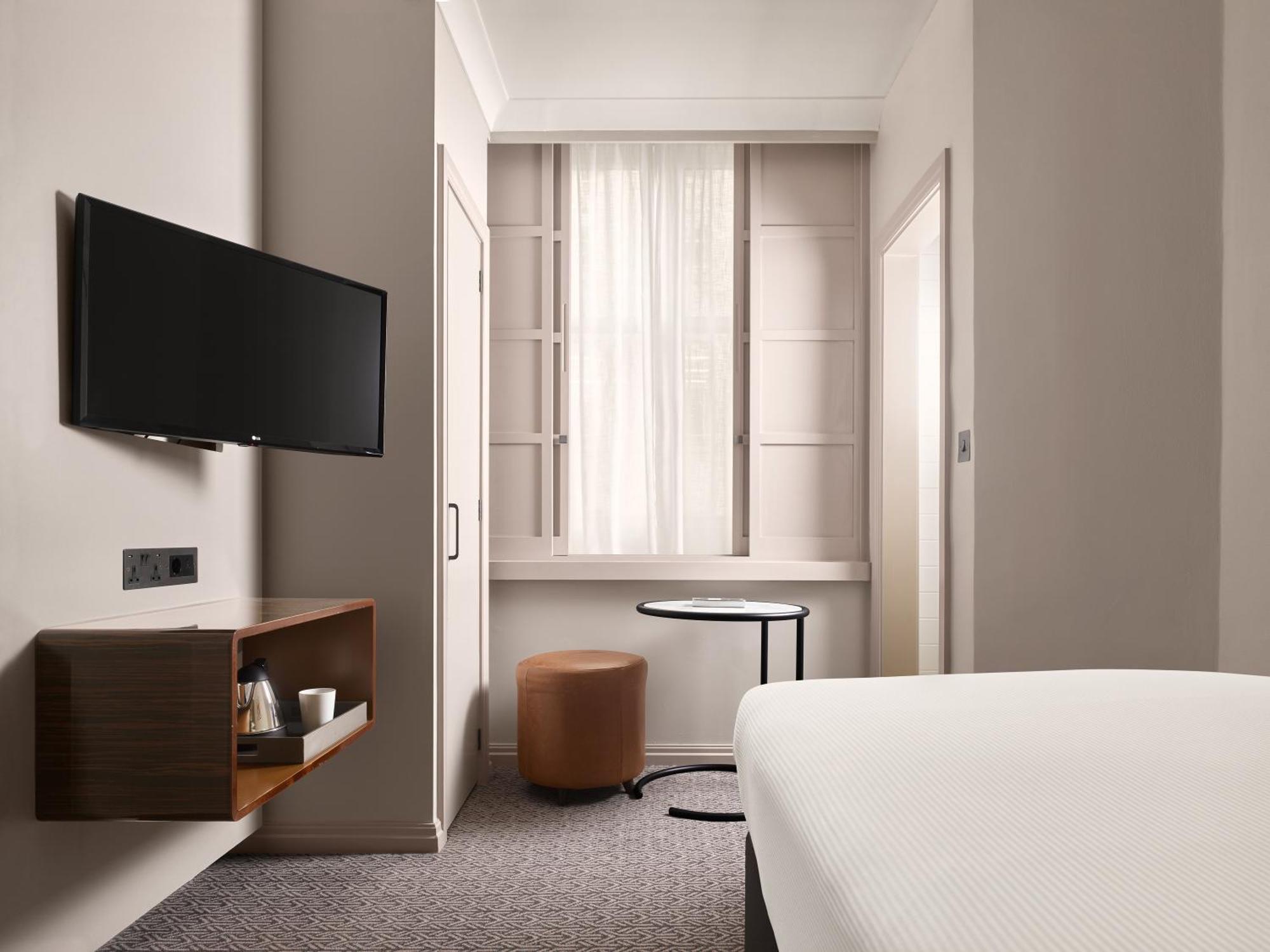 Strand Palace London Room photo The interior of a room at the hotel